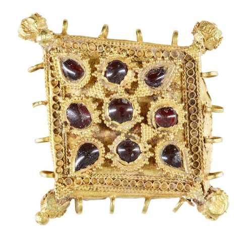 ArtChart | A garnet-set gold pendant element, Iran, 12th century by Unknown Artist
