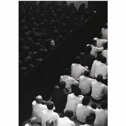 ArtChart | FERVOR (CROWD FROM BACK, WOMAN LOOKING OVER HER SHOULDER) by Shirin Neshat