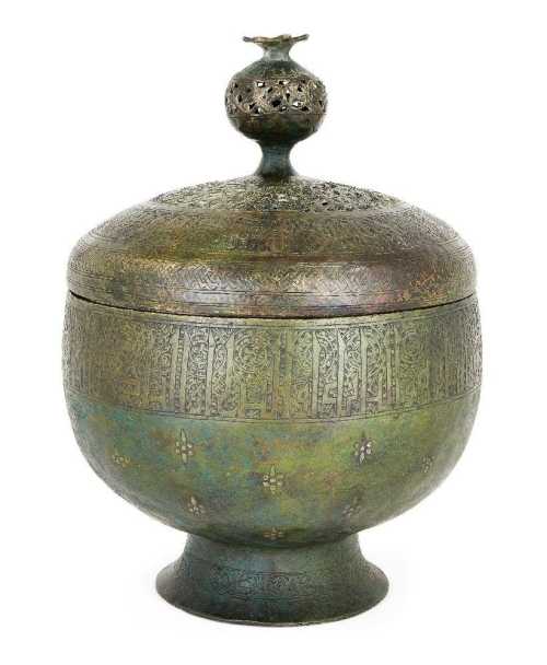 ArtChart | A large inscribed bronze lidded incense burner with silver inlay, Iran, 13th century by Unknown Artist