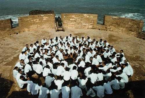 ArtChart | rapture (Men seated on circle, Ablution) by Shirin Neshat