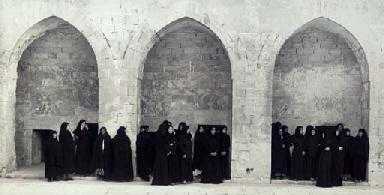 ArtChart | Veiled women in three arches (Soliloquy series) by Shirin Neshat